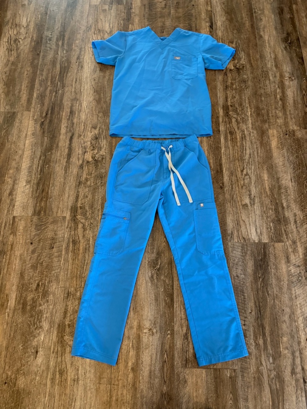 Bright Blue Medical Scrub Set with Pocket Logo
